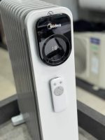 شوفاژ برقی مایدیا مدل MHO231R11BPW ۱۱ پره